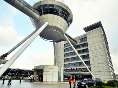 Da Zhong Hotel Indoor Stadium Xuhui Шанхай Экстерьер фото